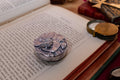 Vintage 1989 Silver plated round trinket pot by Silver Scenes featuring a sculpted poppy flower and bee on the lid, opening to a blue velvet interior.