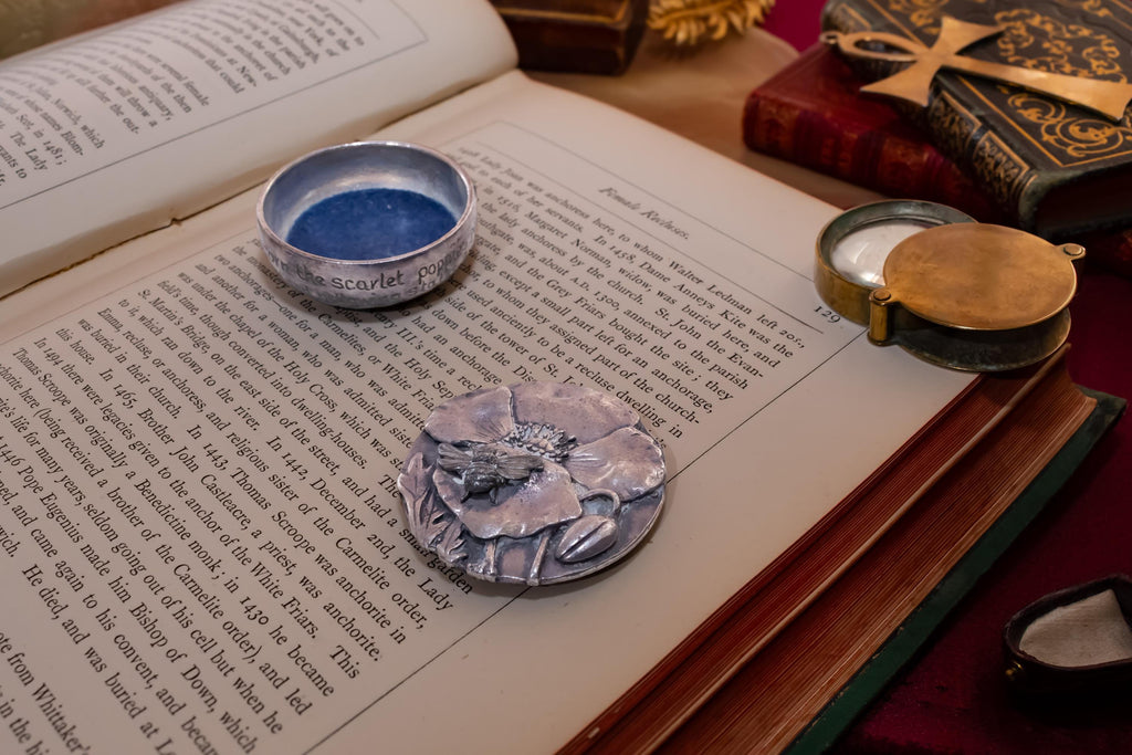 Vintage 1989 Silver plated round trinket pot by Silver Scenes featuring a sculpted poppy flower and bee on the lid, opening to a blue velvet interior.